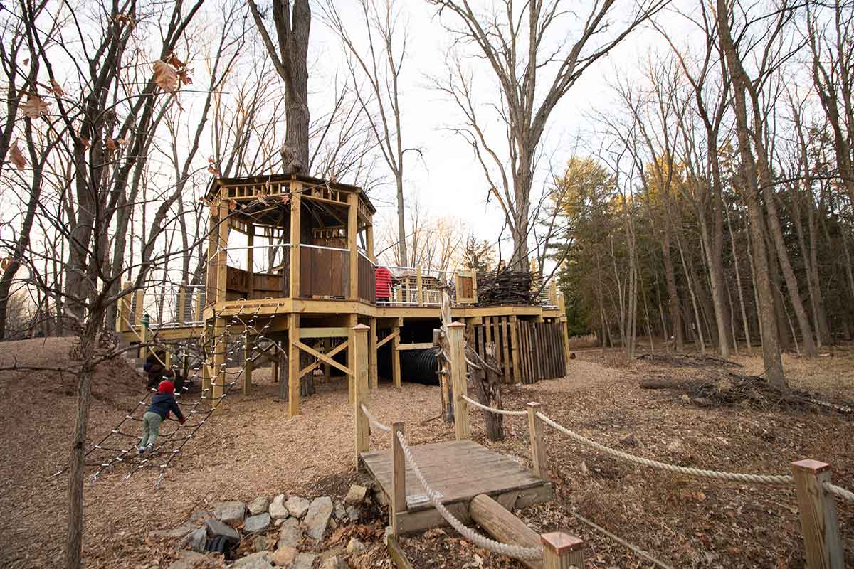 kids playing on the heckrodt natural playground menasha