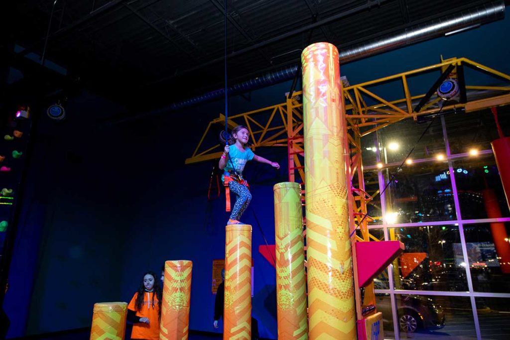 Climbing rock wall and structures at Urban Air Adventure Park Appleton