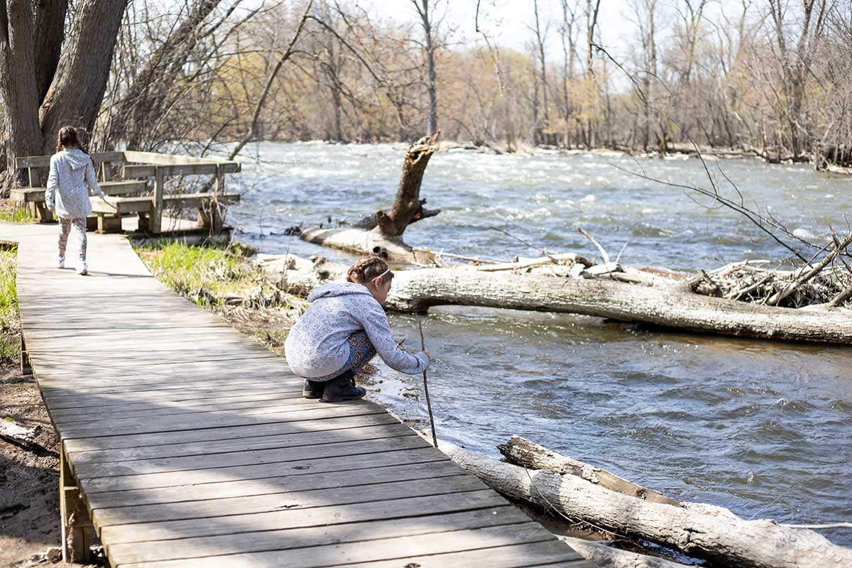 kids walking on boardwalk trails at 1000 Islands Nature Center in Kaukauna