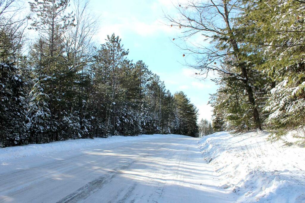 Snowy winter road in Minocqua