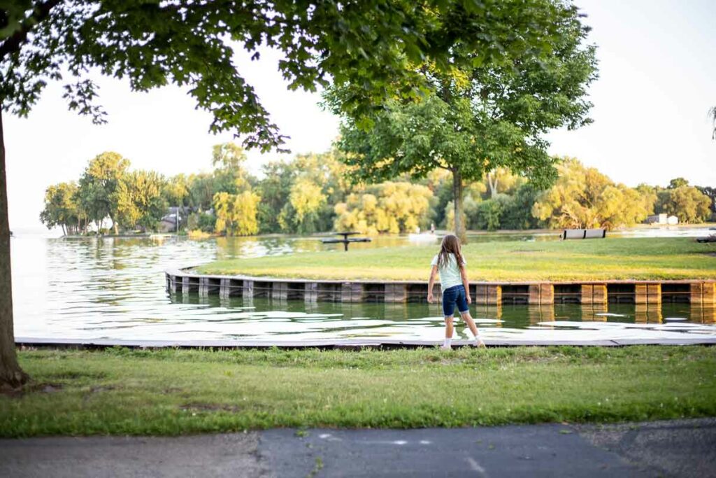 Kids skipping rocks at Jefferson Park in Menasha