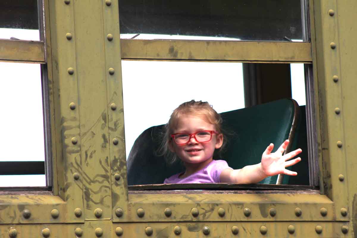 kid on train at Mid Continent Railway Museum