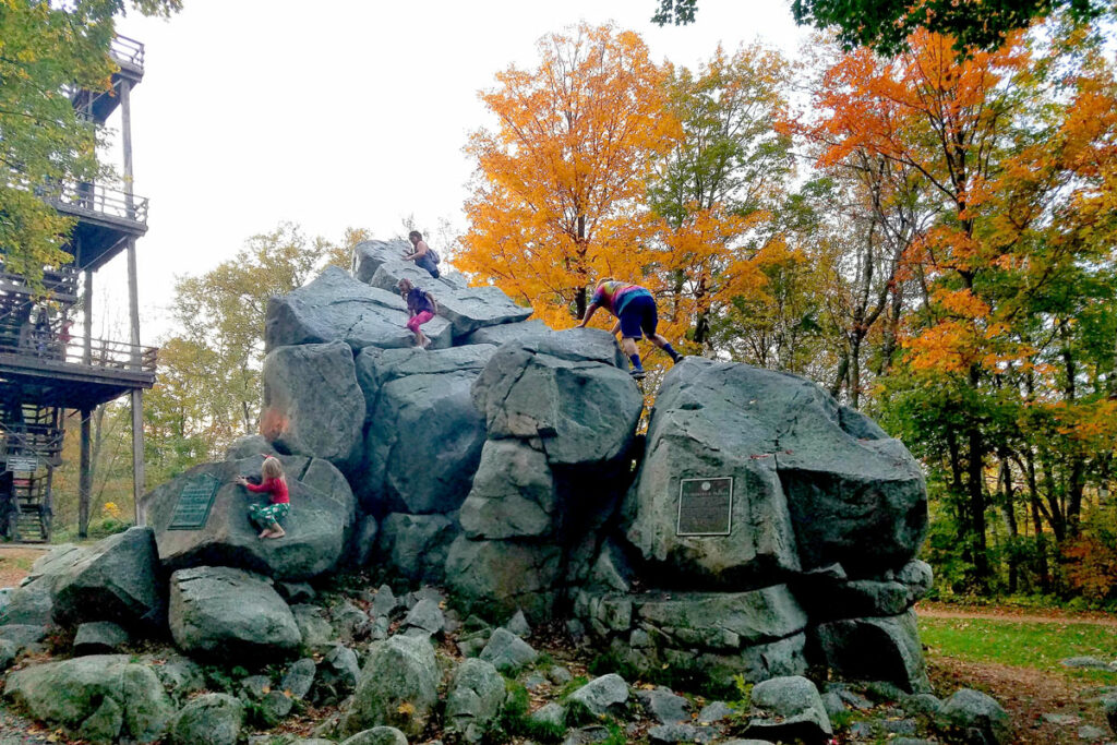 Kids climbing on rocks at Rib Mountain State Park