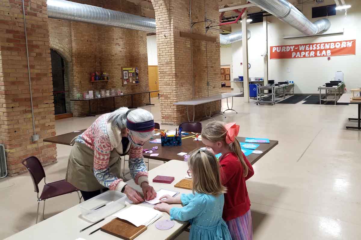 Learning how to make paper at Paper Discovery Center in Appleton
