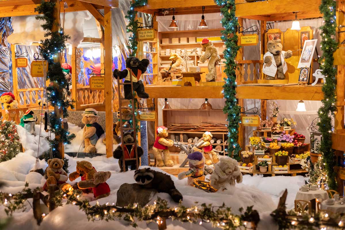 Gallery adds window display with Christmas village, train set